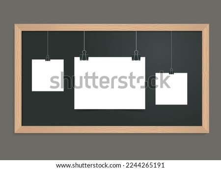 White paper sheets hanging on binder clips on black school chalkboard. Set of Blank notes on blackboard. Vector realistic Mockup. Posters template for presentations or design. 