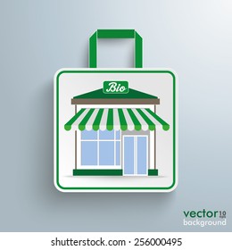 White paper shopping bag with bioshop on the gray background. Eps 10 vector file.