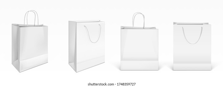 White paper shopping bags front and angle view. Vector realistic mockup of blank packet with handles isolated on white background. Template for corporate design on cardboard bag for store or market