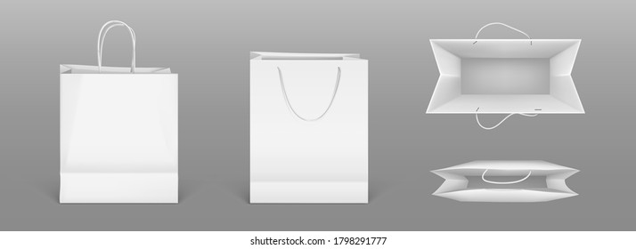 White paper shopping bags front and top view. Vector realistic mockup of blank packet with handles isolated on gray background. Template for corporate design on cardboard bag for store or market