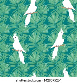White parrot pattern with tropical leaves. Tropical seamless background with parrot, tropical leaves and hibiscus flowers. Beautiful black Corella