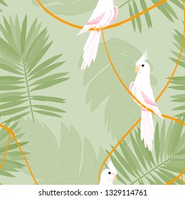 White parrot pattern with tropical leaves.Tropical seamless pattern with parrot, tropical leaves and hibiscus flowers. Beautiful White Corella.