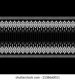 The white pattern consists of lines, triangles, squares and circles on a black background.