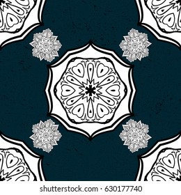White pattern on blue background with white elements.  