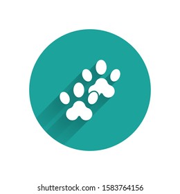 White Paw print icon isolated with long shadow. Dog or cat paw print. Animal track. Green circle button. Vector Illustration