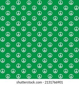 White peace symbol on green background. Peace pattern on green backdrop.