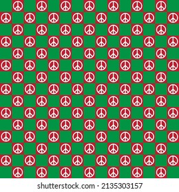 White peace symbol on red and green checker background. Peace pattern on red and green backdrop.