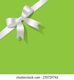 White pearl ribbon on the green background