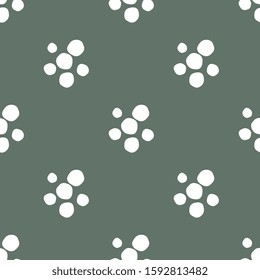 White peas in the shape of a flower, on a green background.
Polka dot fabric design. Retro background or pattern.
