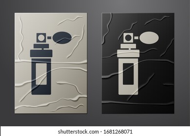 White Perfume icon isolated on crumpled paper background. Paper art style. Vector Illustration