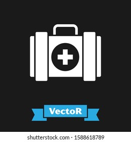 White Pet first aid kit icon isolated on black background. Dog or cat paw print. Clinic box.  Vector Illustration
