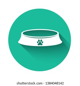 White Pet food bowl for cat or dog icon isolated with long shadow. Dog or cat paw print. Green circle button. Vector Illustration