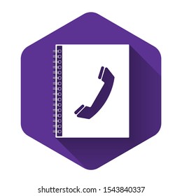 White Phone book icon isolated with long shadow. Address book. Telephone directory. Purple hexagon button. Vector Illustration