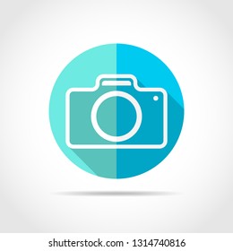 White photo camera in flat design with long shadow. Vector illustration. Simple photo camera icon on blue round button.