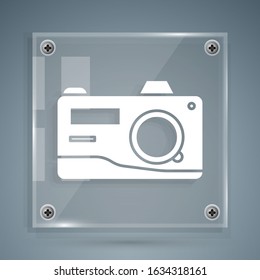 White Photo camera icon isolated on grey background. Foto camera icon. Square glass panels. Vector Illustration