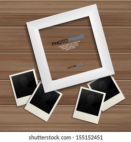 White photo frame and blank photo on wooden background - Vector illustration