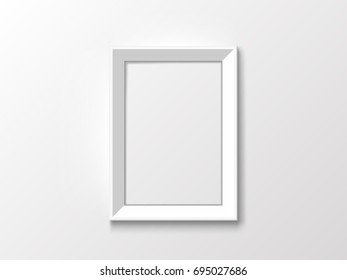 white picture frame on white wall