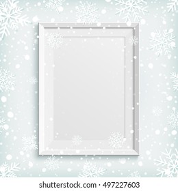 White picture frame on winter background with snow and snowflakes. Template for greeting card, poster or brochure. Vector illustration.