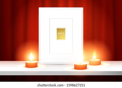 White picture or photo frame  together with three burning candles on a shelf near the red curtain. Realistic mockup for design