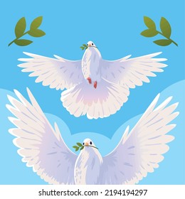 palomas blancas y hojas de paz