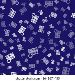 White Pills in blister pack icon isolated seamless pattern on blue background. Medical drug package for tablet, vitamin, antibiotic, aspirin.  Vector Illustration