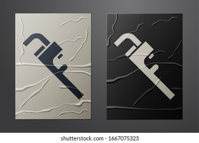 White Pipe adjustable wrench icon isolated on crumpled paper background. Paper art style. Vector Illustration