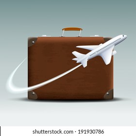 white plane flies around the brown suitcase