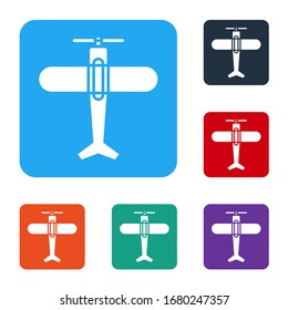 White Plane icon isolated on white background. Flying airplane icon. Airliner sign. Set icons in color square buttons. Vector Illustration