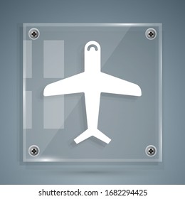 White Plane icon isolated on grey background. Flying airplane icon. Airliner sign. Square glass panels. Vector Illustration