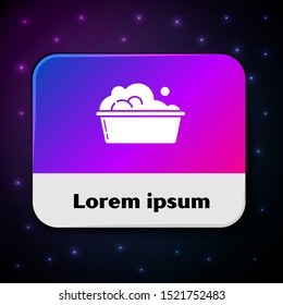 White Plastic basin with soap suds icon isolated on black background. Bowl with water. Washing clothes, cleaning equipment. Rectangle color button. Vector Illustration