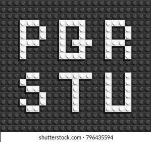 White Plastic Letters From Building Lego Bricks. Black Lego Background