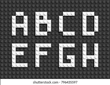 White Plastic Letters From Building Lego Bricks. Black Lego Background