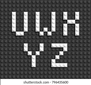 White Plastic Letters From Building Lego Bricks. Black Lego Background