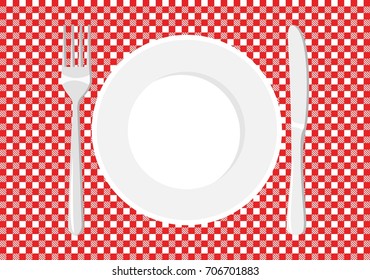 White plate on a checkered tablecloth