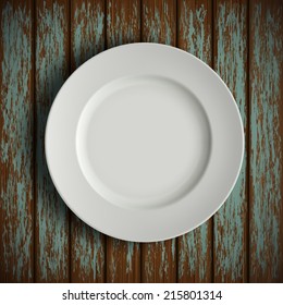 white plate on old wooden table