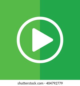 White play button vector icon. Green background