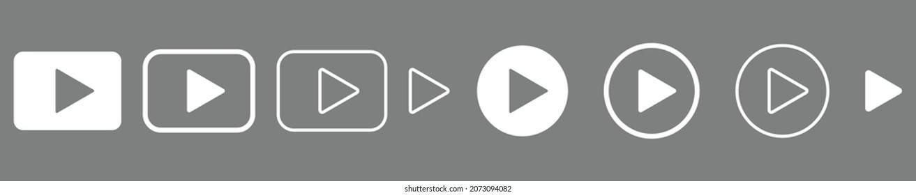 White play buttons. Vector icons. Music video start signs isolated on gray background