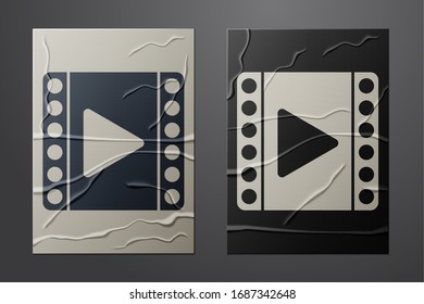 White Play Video icon isolated on crumpled paper background. Film strip sign. Paper art style. Vector Illustration