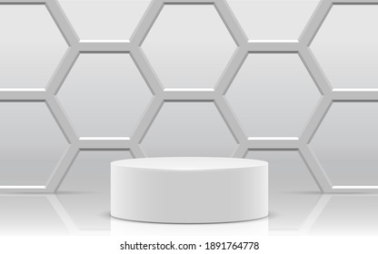 white podium and hexagon wall in the white studio room