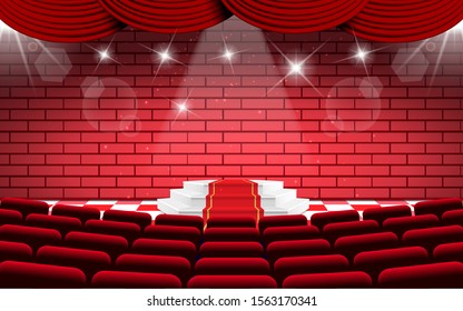 white podium on the stage with red chairs in the hall