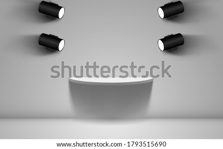 white podium and spotlight in the studio room