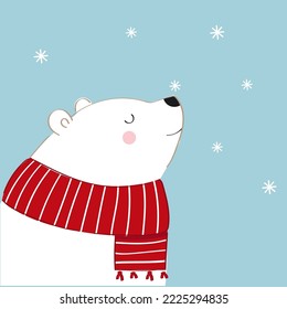 White polar bear wearing a red scarf.