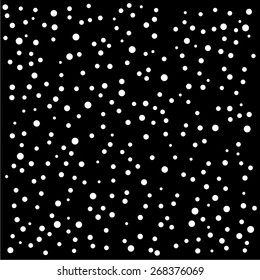 White polka dots of different sizes in random pattern on black background - vector illustration. 