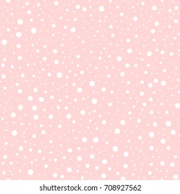 White polka dots seamless pattern on pink background.