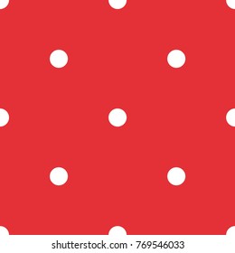 White polka dots seamless pattern on red background.