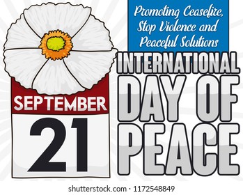 White poppy with a loose-leaf calendar and some precepts to promote International Day of Peace this 21st September.