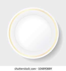 white porcelain plate with gold patterned in strips along the edges on a white background