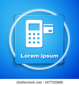White Pos terminal with inserted credit card icon isolated on blue background. Payment terminal transaction. Blue square button. Vector Illustration