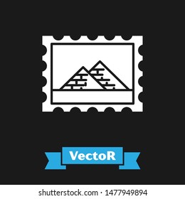 White Postal stamp and Egypt pyramids icon isolated on black background.  Vector Illustration