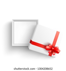 White present box with red ribbon bow top view. Vector opened surprise package for christmas, birthday celebration design. Boxing day, black friday discount banners element, isolated background